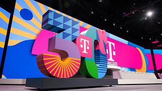 A large, colorful “30”, set up on a stage.